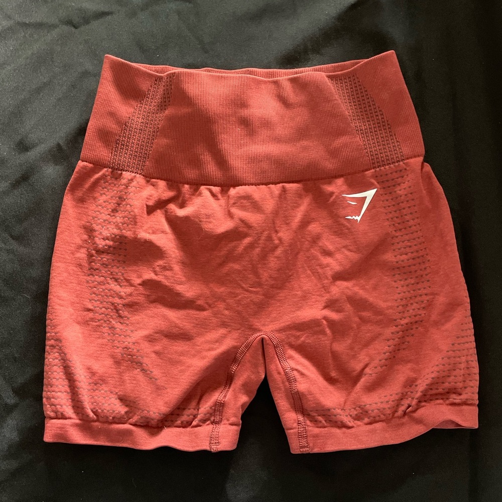 Barely worn gym shark shorts in copper
